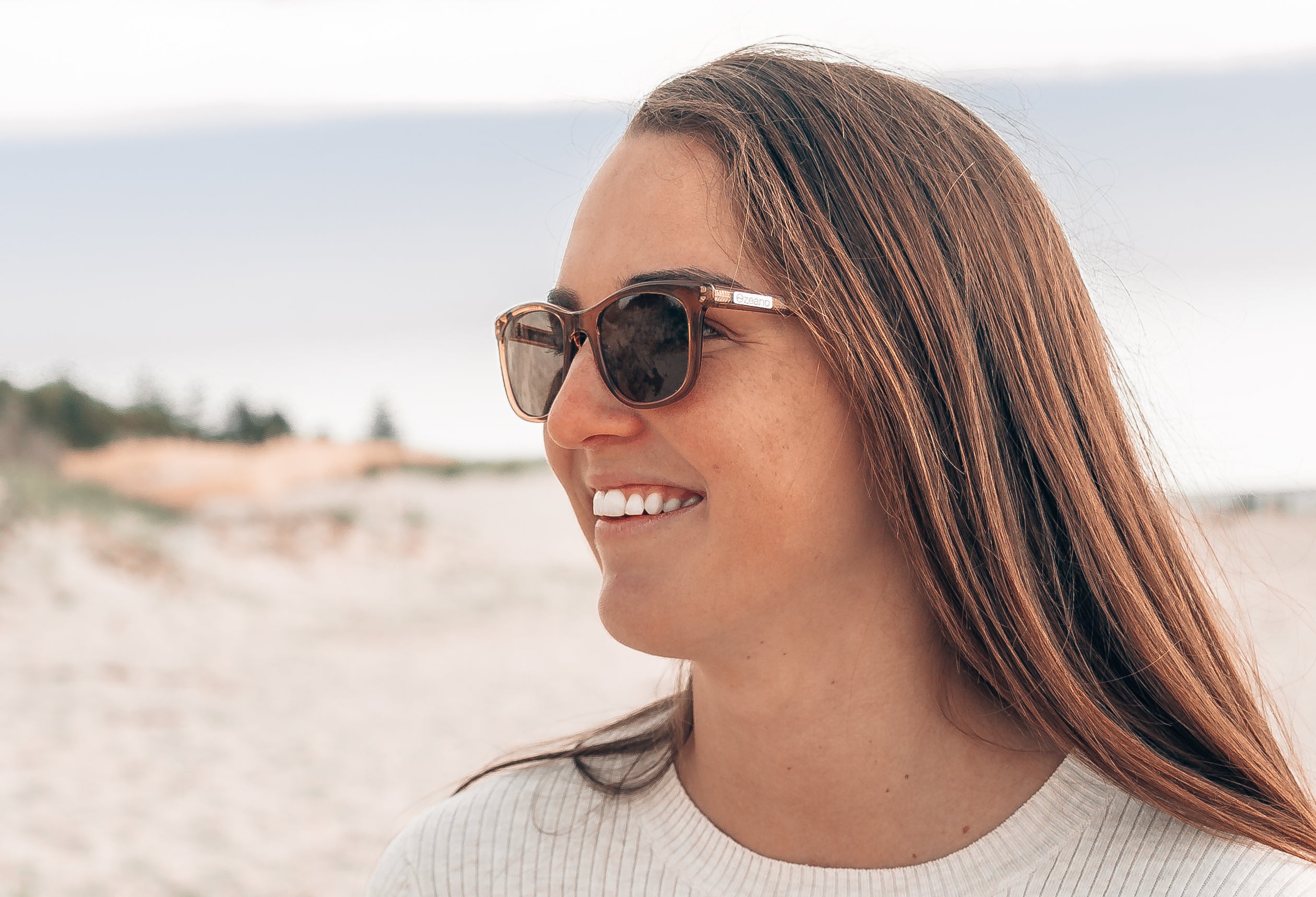 Model wearing brown plant based frames Tama_Otter