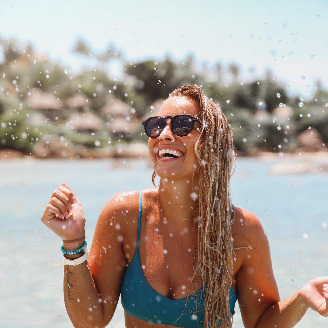 model wearing Orca Sunglasses UV400