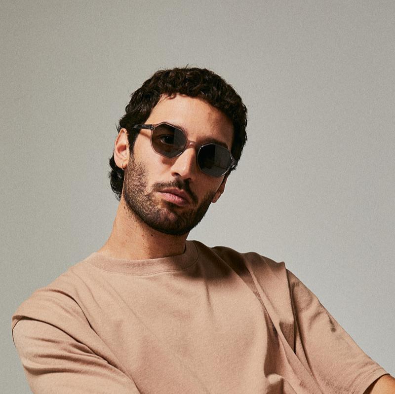 Male model wearing grey sawfish polarised sunglasses from Ozeano Vision