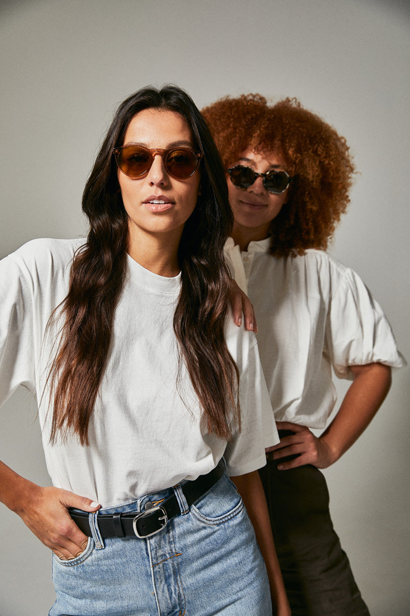 Female model wearing brown prescription sunglasses